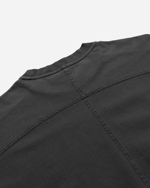 Close-up back detail of the fabric texture on the garment dyed drop shoulder heavy tee