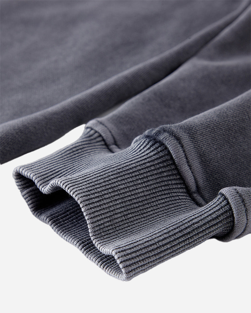 Close-up of the cuff on the Heavy Hoodie in Washed Blue, featuring the snug fit and ribbed design for added comfort