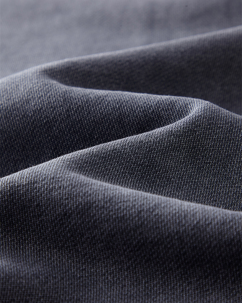 Detailed view of the fabric on the Heavy Hoodie in Washed Blue, emphasizing the texture and quality of the 420gsm cotton